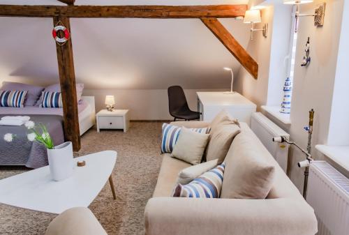 Posezení v ubytování Skarbek Iława, pokoje i apartamenty
