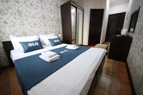 Krevet ili kreveti u jedinici u objektu OLO Marsel Krasnodar Hotel