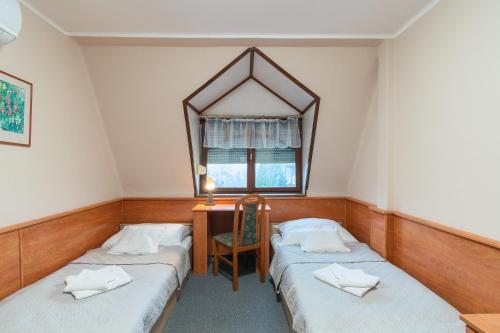 Cama o camas de una habitación en Delanta Panzio