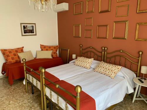 Postel nebo postele na pokoji v ubytování B&B Fiorisol
