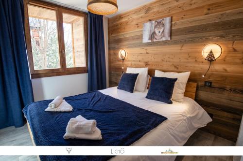 Tempat tidur dalam kamar di MARMOTTE 102 - Beau T4 pour 10, aux pieds des pistes