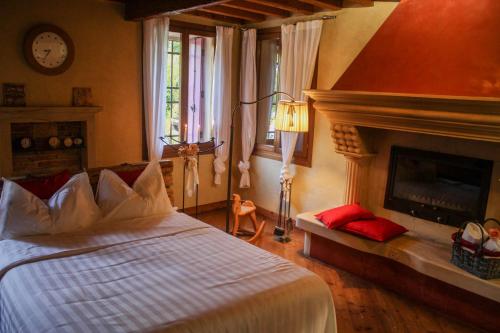 Postel nebo postele na pokoji v ubytování B&B BAGOLARI