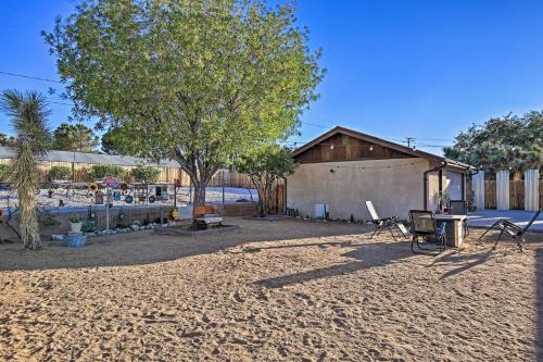 a group of chairs and a building on a beach at Charming Home, 8 Mi to Joshua Tree Natl Park in Yucca Valley
