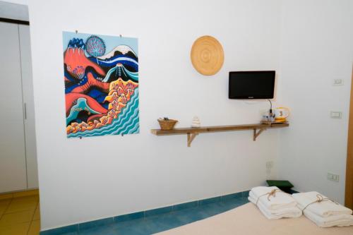 TV a/nebo společenská místnost v ubytování Casa Junno
