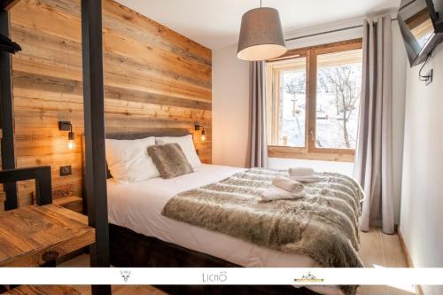 Ліжко або ліжка в номері MARMOTTE 005 - Splendide appartement avec terrasse, aux pieds des pistes