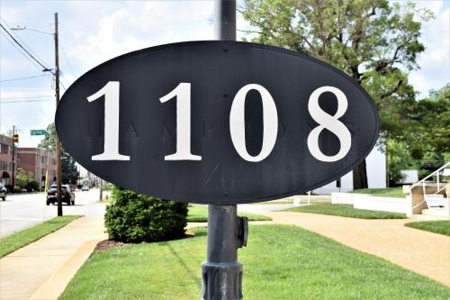 a sign that reads on a street at JH Adams Inn, Trademark Collection by Wyndham in High Point