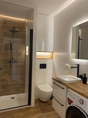 Kúpeľňa v ubytovaní Apartament Słoneczna Zatoka