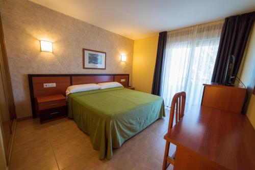 Кровать или кровати в номере Hotel Atlántico Sanxenxo