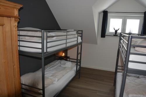 Postel nebo postele na pokoji v ubytování Vakantiehuiswinterberg
