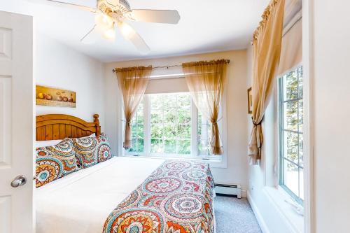 Katil atau katil-katil dalam bilik di Aspen Cottage