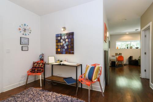 a home office with a desk and two chairs at House 5863- Chicago's Premier Bed and Breakfast in Chicago