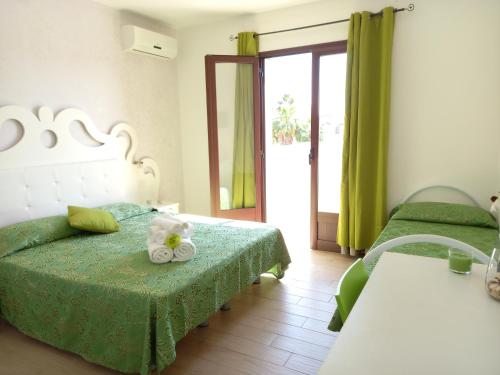 A bed or beds in a room at Tesori del Salento