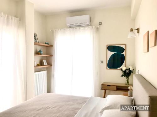 Postel nebo postele na pokoji v ubytování Sunkissed Terrace Apartments