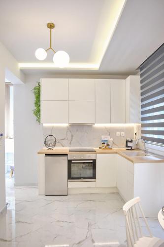 Kuchyň nebo kuchyňský kout v ubytování Elegant Central Apartment Veria - με ενδοδαπέδια θέρμανση!!!