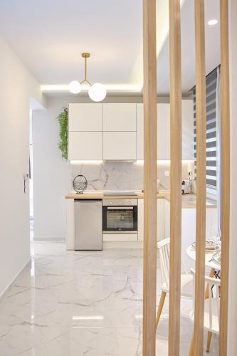 Kuchyň nebo kuchyňský kout v ubytování Elegant Central Apartment Veria - με ενδοδαπέδια θέρμανση!!!