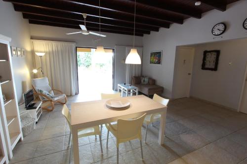 Posezení v ubytování Kas Hoi in Sabalpalm Villas