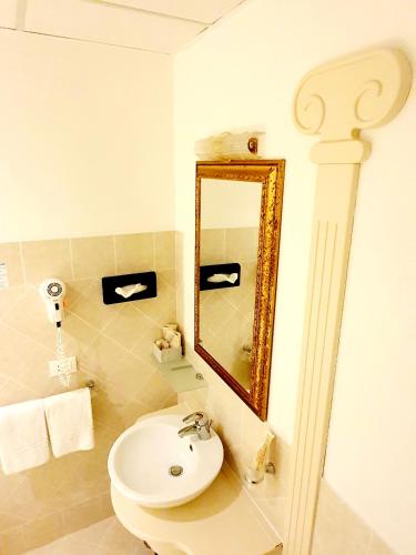 Koupelna v ubytování Hotel Corte dei Greci