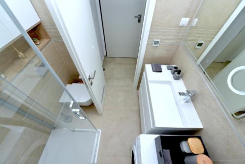 Ein Badezimmer in der Unterkunft Exclusive Residence Apartment