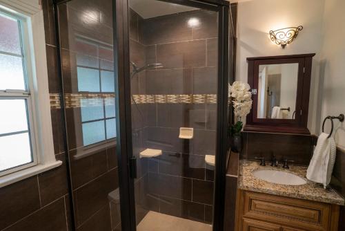 a bathroom with a shower and a sink at Cozy Suite near Universal Studios in Los Angeles