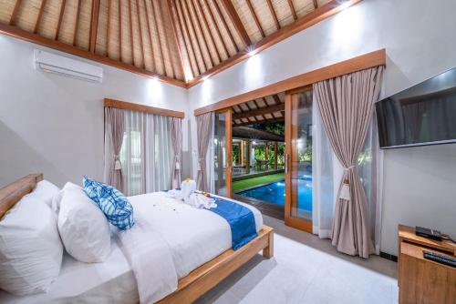 Вид на бассейн в Villa Litera Canggu Bali или окрестностях