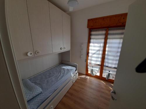 Posteľ alebo postele v izbe v ubytovaní Casa Stella Marina