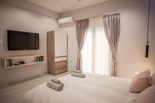 Postel nebo postele na pokoji v ubytování Luxury Apt 115m2