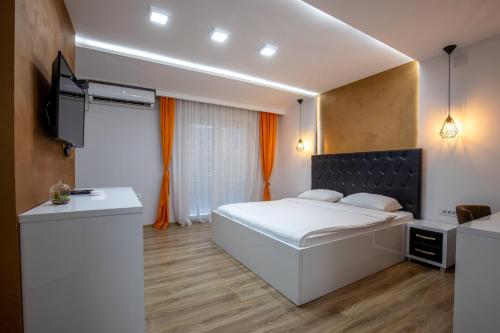 Ένα ή περισσότερα κρεβάτια σε δωμάτιο στο Motel Milošević
