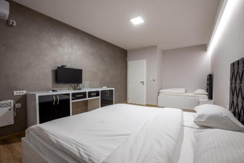Ένα ή περισσότερα κρεβάτια σε δωμάτιο στο Motel Milošević