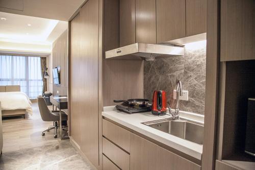 Una cocina o cocineta en Modena by Fraser Changsha