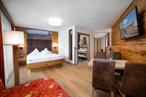 Postel nebo postele na pokoji v ubytování Kohlerhof - 4 Star Wellness & Active Hotel