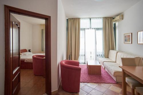 Ένα ή περισσότερα κρεβάτια σε δωμάτιο στο Apartments Secret Garden