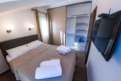 Postel nebo postele na pokoji v ubytování Summer home Morinj