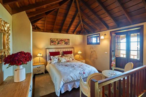 En eller flere senge i et værelse på Casa Ana