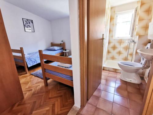 Kúpeľňa v ubytovaní Apartmani Denis Vela