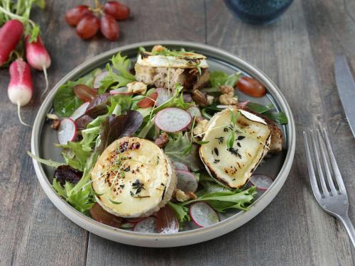a plate of food with a salad with meat and vegetables at Novotel Paris Rueil Malmaison in Rueil-Malmaison