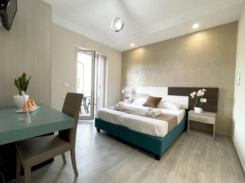 En eller flere senge i et værelse på B & B Vilenia San Nicola Arcella