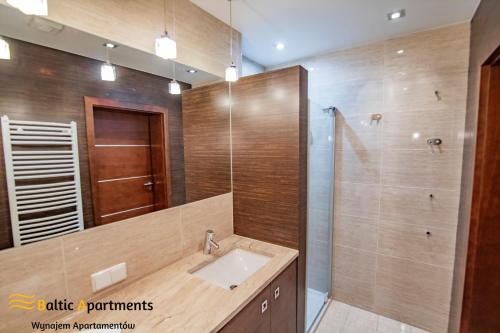 Kúpeľňa v ubytovaní Baltic Apartments - Bałtycka