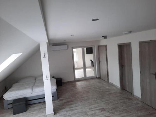 Postel nebo postele na pokoji v ubytování Apartmán Vimperk