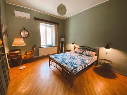 
Кровать или кровати в номере Corner Guest House
