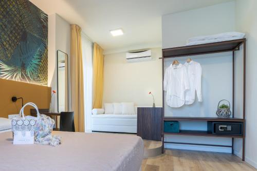Postel nebo postele na pokoji v ubytování Hotel Suez