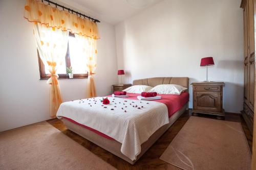 Postel nebo postele na pokoji v ubytování Apartman Sofija