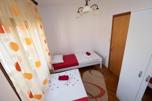 Postel nebo postele na pokoji v ubytování Apartman Sofija