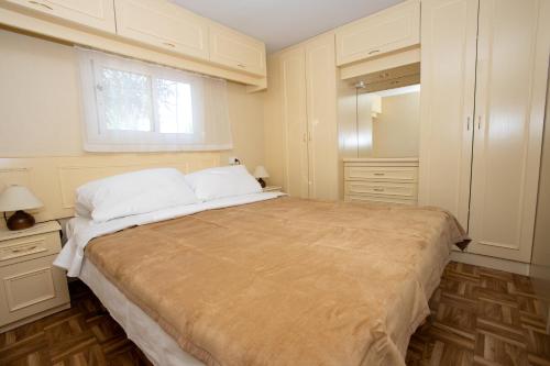Un pat sau paturi într-o cameră la Mobilhome Costa del Sol