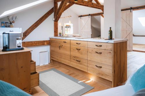 A cozinha ou cozinha compacta de Ambiente & Comfort im historischen Anwesen
