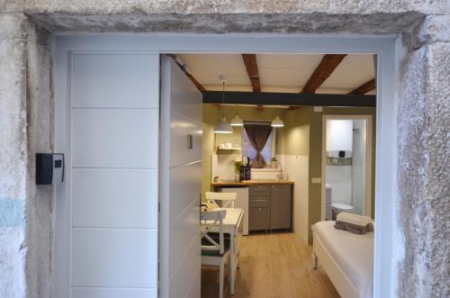 Η κουζίνα ή μικρή κουζίνα στο Suite Lisa