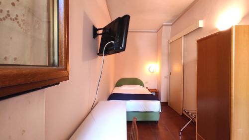 TV a/nebo společenská místnost v ubytování Hotel Rita Major