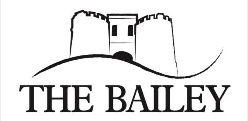 a black and white logo for the bakery at The Bailey Shepherd's Hut and Holiday Cottage in Skipton