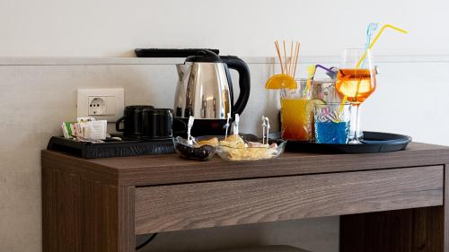 Hotel Estenseにあるコーヒーまたはお茶