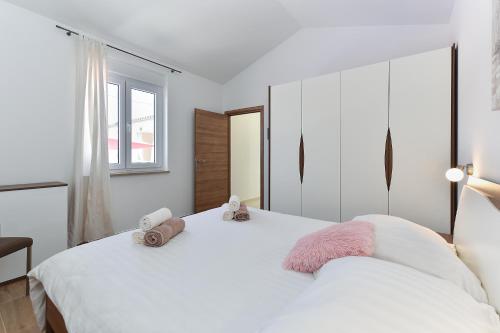 Ένα ή περισσότερα κρεβάτια σε δωμάτιο στο Villa Divsici 2105