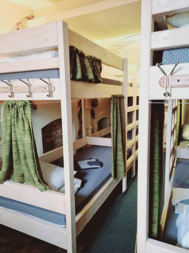 a bunk bed room with two bunk beds at HelloVilniusHostel in Vilnius